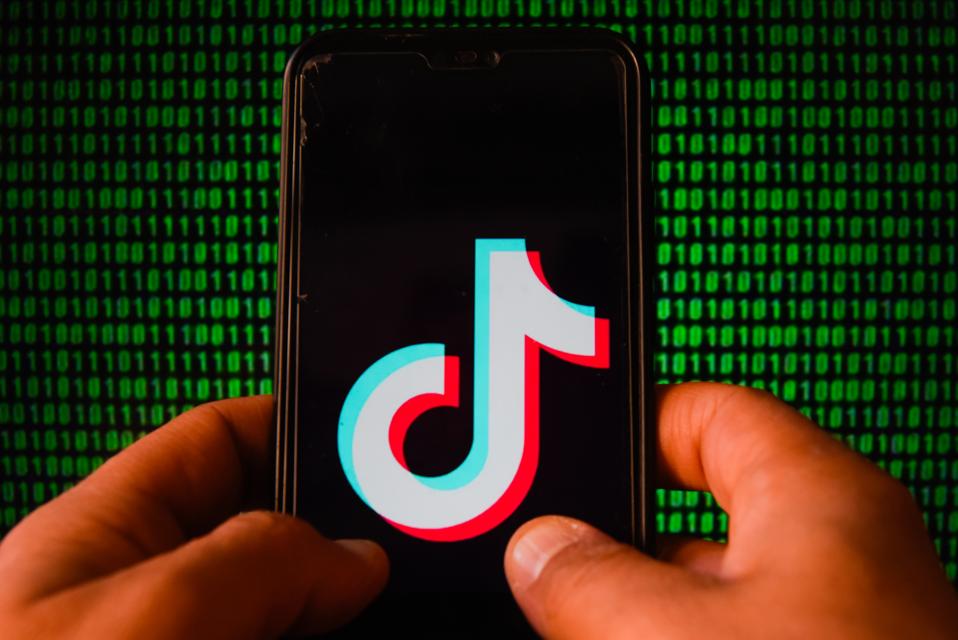 TikTok logo displayed on a smartphone