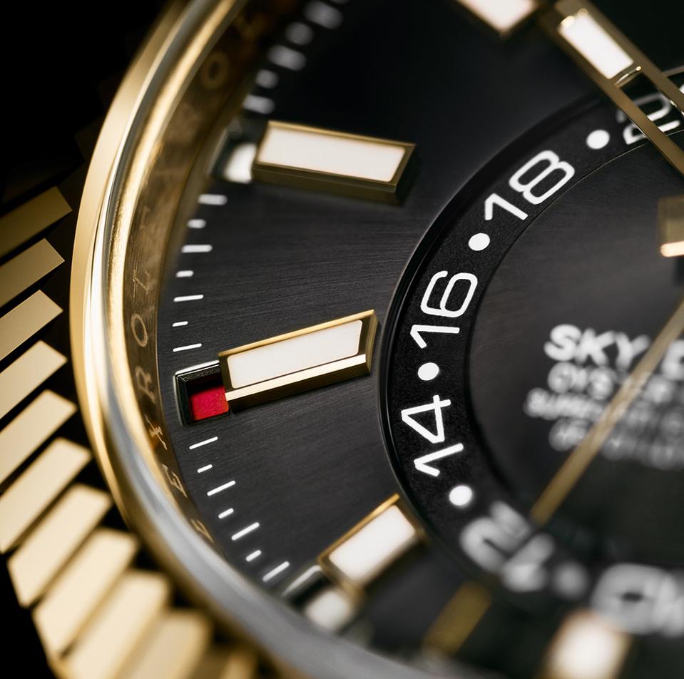 The new Rolex Sky-Dweller, in 18k yellow gold, shows the date discreetly under the corresponding hour marker.