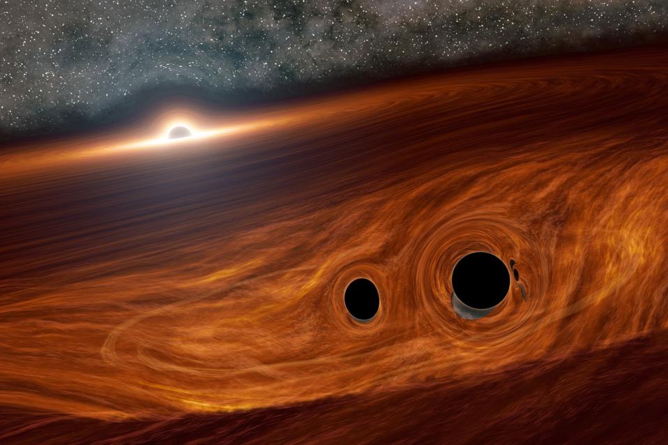 Two stellar mass black holes in the accretion disk of a supermassive, active black hole.