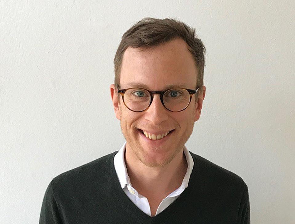 Portrait of smiling entrepreneur with glasses