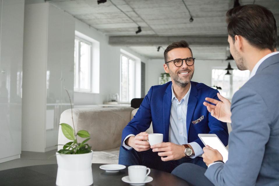Business people having a discussing in break