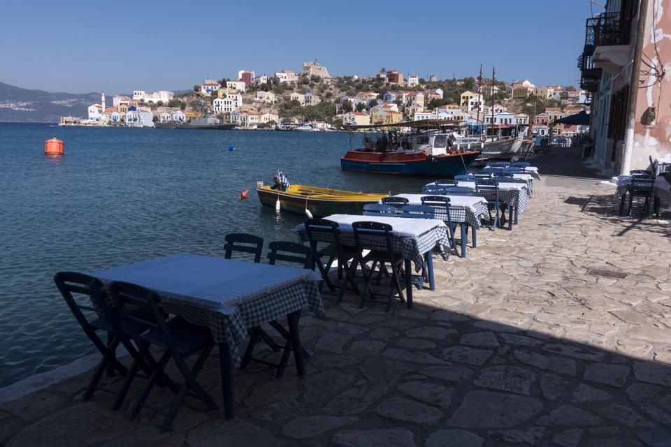 empty tables on Greek island amid Covid resurgence and new wave of travel bans EU Europe