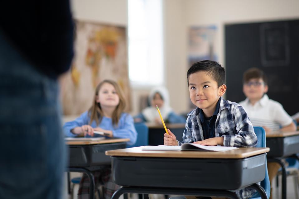 Students Listening to Their Teacher Speak