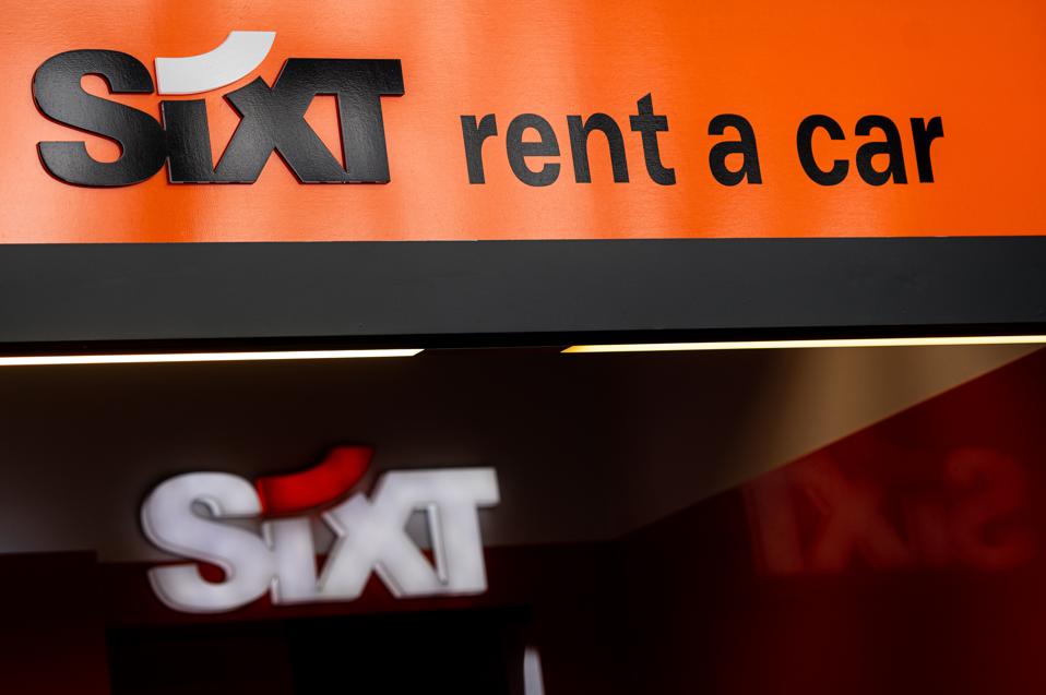 A sixt rent a car logo seen at the Gdansk Lech Walesa...