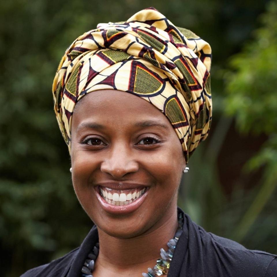 Photo of Marcia Brisset-Bailey, inclusion campaigner activist and professional, smiling.