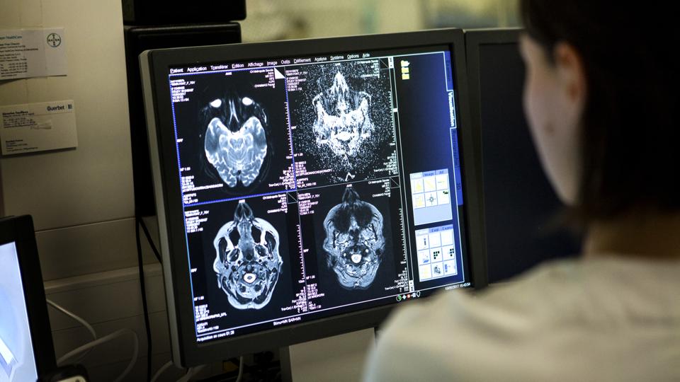 MRI scans are analyzed by a medical professional