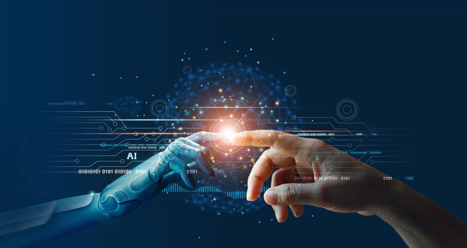 Machine learning illustrated by hands of robot and human touching.