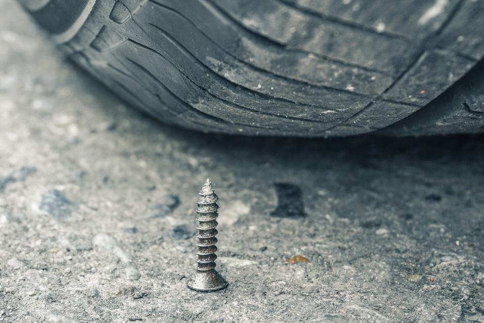 Metal spike and tire