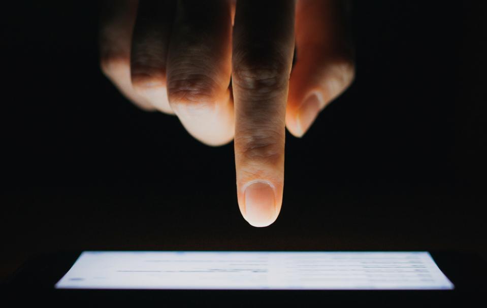 Close up of woman's hand checking phone