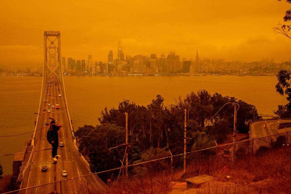 Red-Orange Skies from the Northern California Wildfires Blanket San Francisco Bay Area