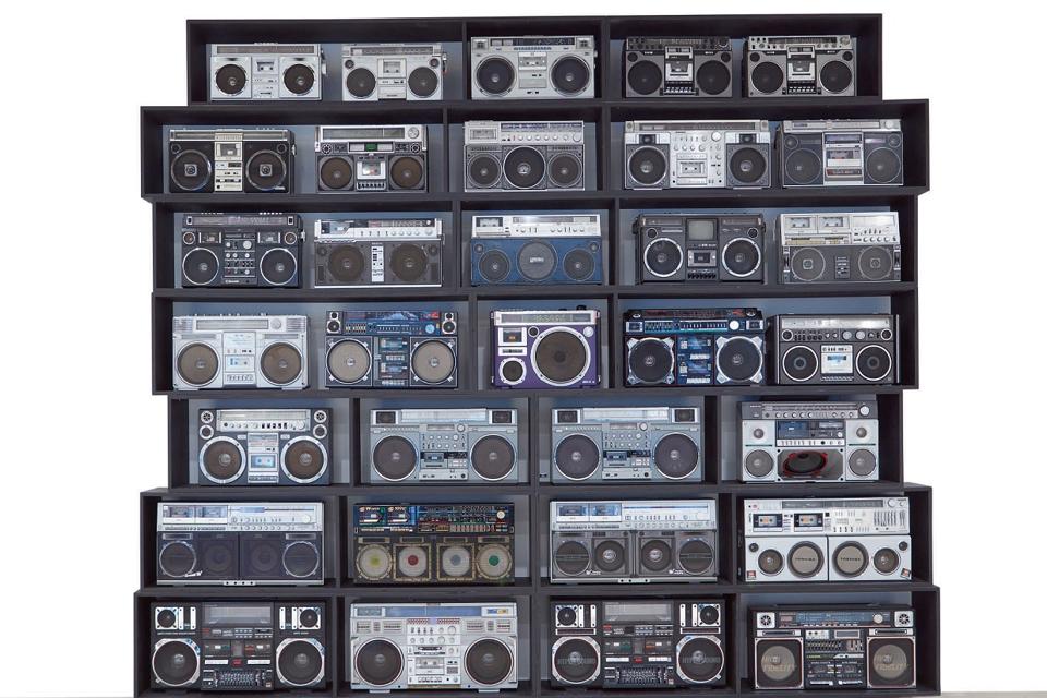 DJ Ross One “The Wall of Boom″ installation of 32 vintage boomboxes. It sold for $113,400