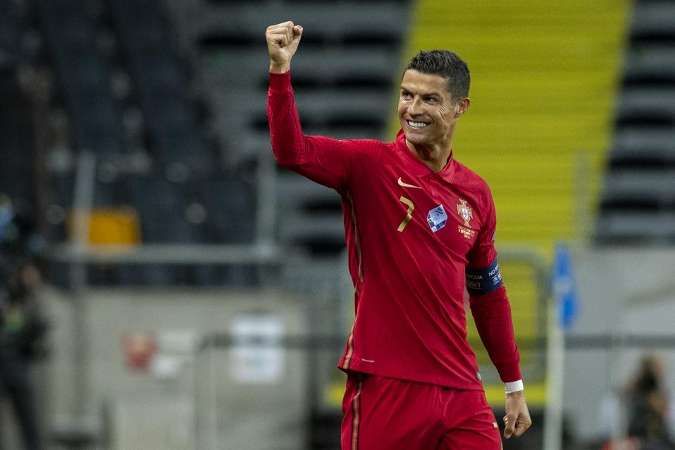 Cristiano Ronaldo celebrates scoring for Portugal against Sweden.