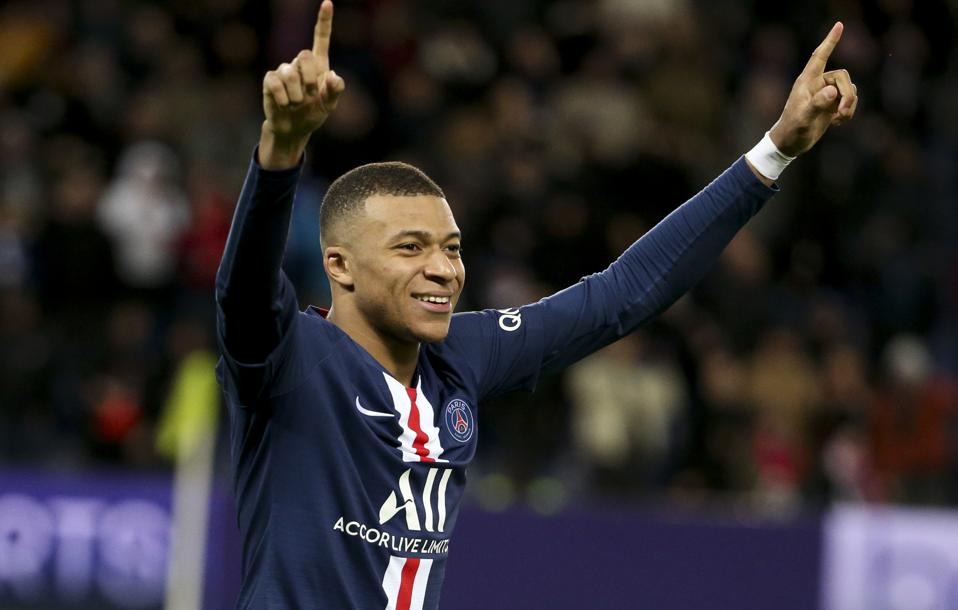 Kylian Mbappe celebrates scoring a goal.