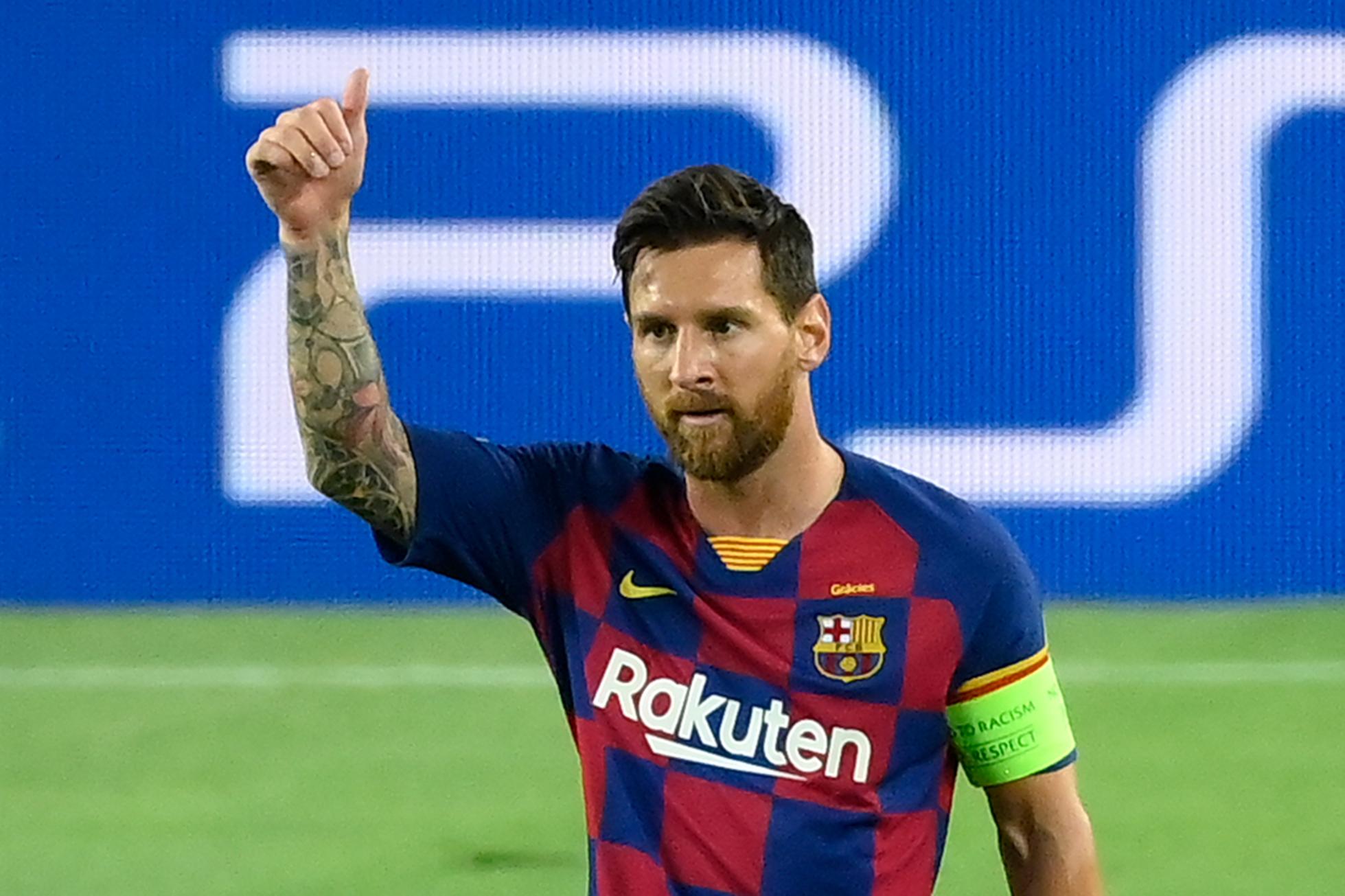 Lionel Messi celebrating scoring a goal in the 2019-20 UEFA Champions League competition.