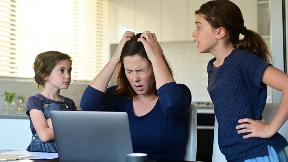 Frustrated mom working from home