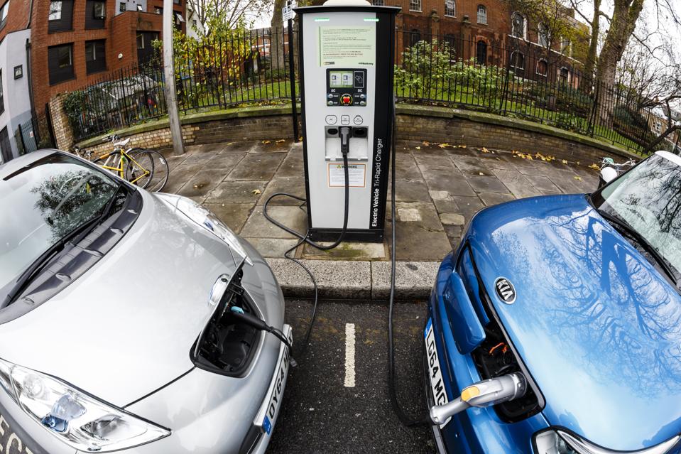 Go Ultra Low Electric Vehicle on charge on a London street