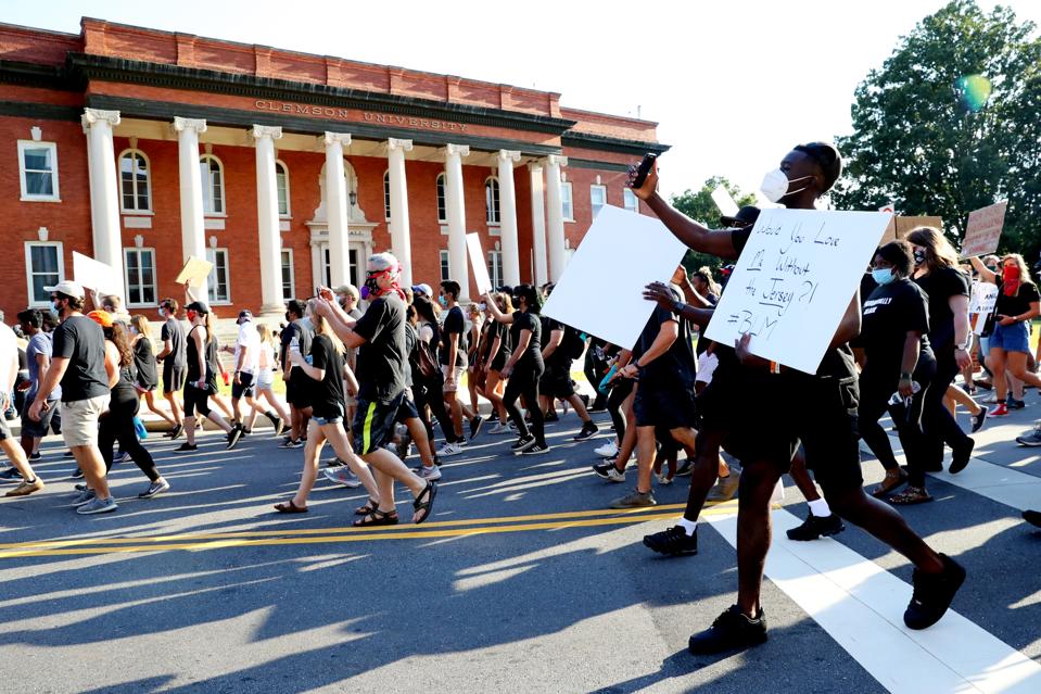 Clemson University Football Team Lead Protest March After Death Of George Floyd