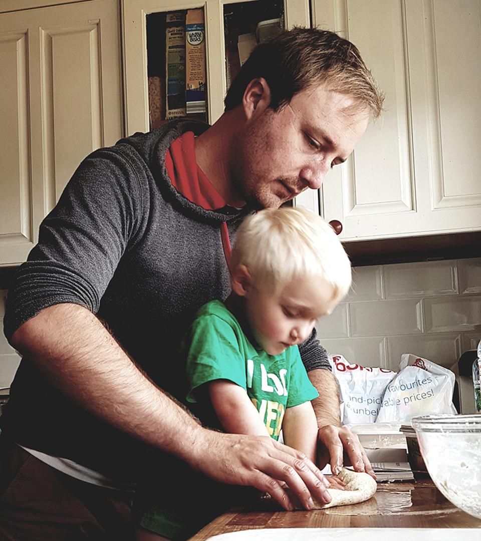 Hold Still, father and toddler making bread