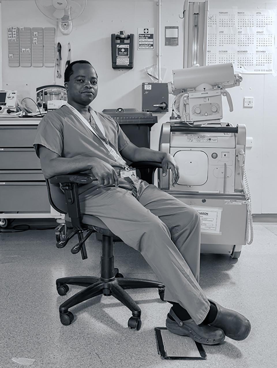 Hold Still Photo Exhibit, A care worker after a tiring night shift