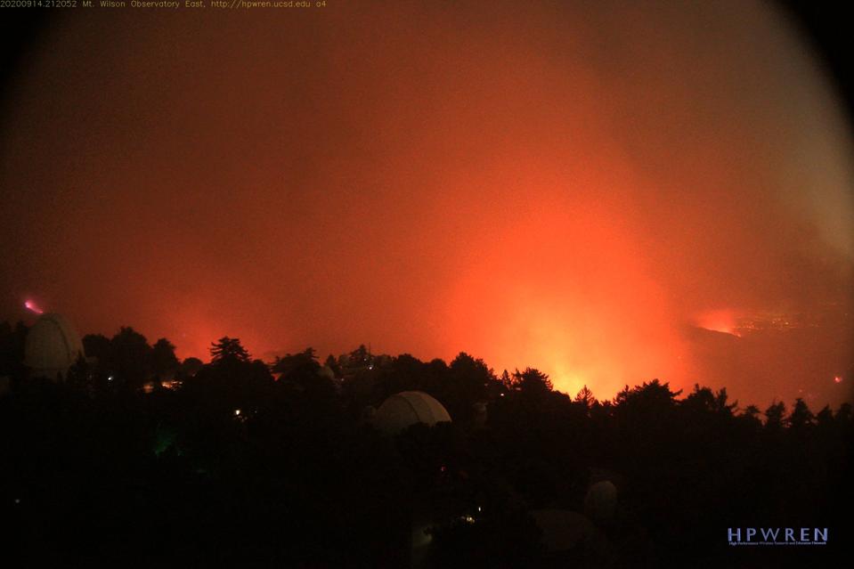 A photo from the HPWREN cameras posted atop Mount Wilson Observatory, showing wildfires.