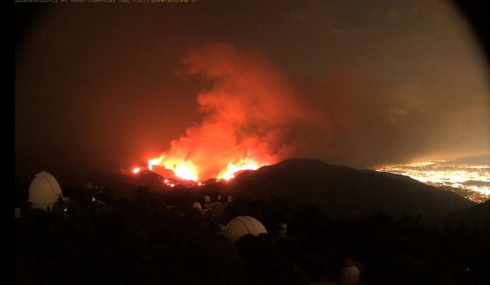 Photo from the HPWREN cameras atop Mount Wilson, showing approaching wildfires.