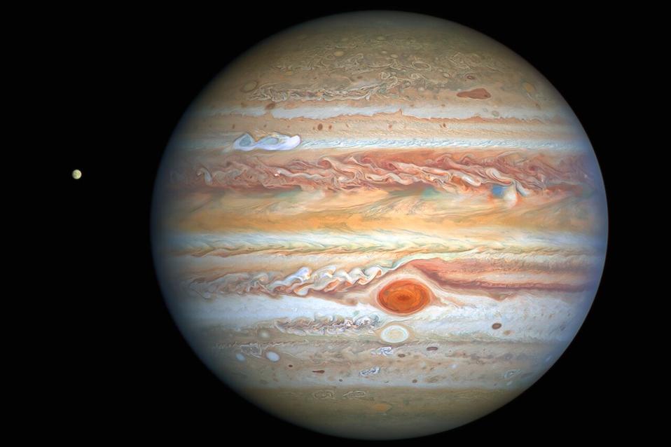 This latest image of Jupiter, taken by the NASA/ESA Hubble Space Telescope on 25 August 2020, was captured when the planet was 653 million kilometres from Earth. Hubble’s sharp view is giving researchers an updated weather report on the monster planet’s turbulent atmosphere, including a remarkable new storm brewing, and a cousin of the Great Red Spot changing colour — again. The new image also features Jupiter’s icy moon Europa.