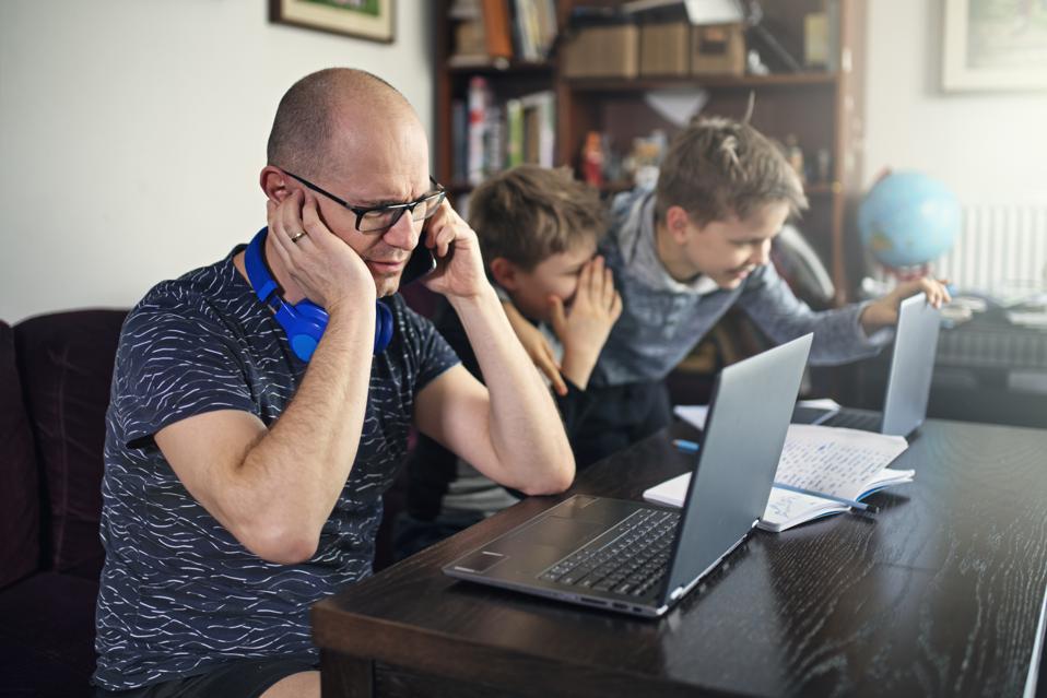 Father trying to work from home while his kids are being very naughty. Nikon D850