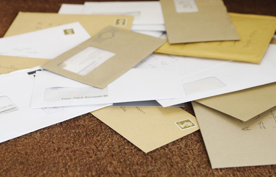 Pile Of Mail On Doormat