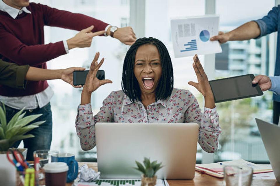 Woman frustrated with co-workers