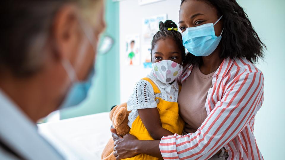 Mother and daughter at the pediatric office