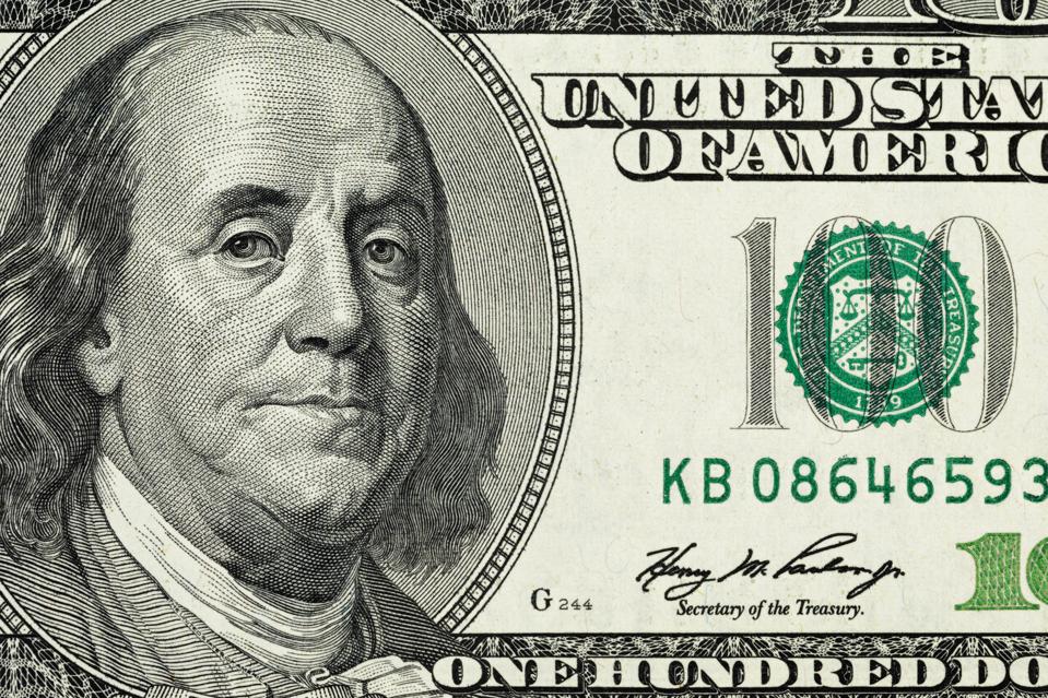 close up photo of one hundred dollar note