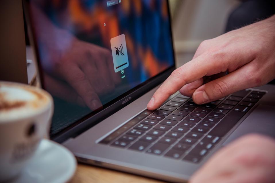 Apple MacBook Pro In Cafe