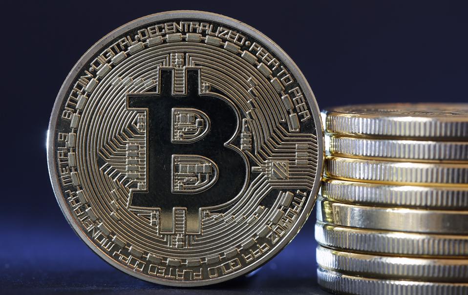 A picture of physical units of bitcoin, a cryptocurrency.