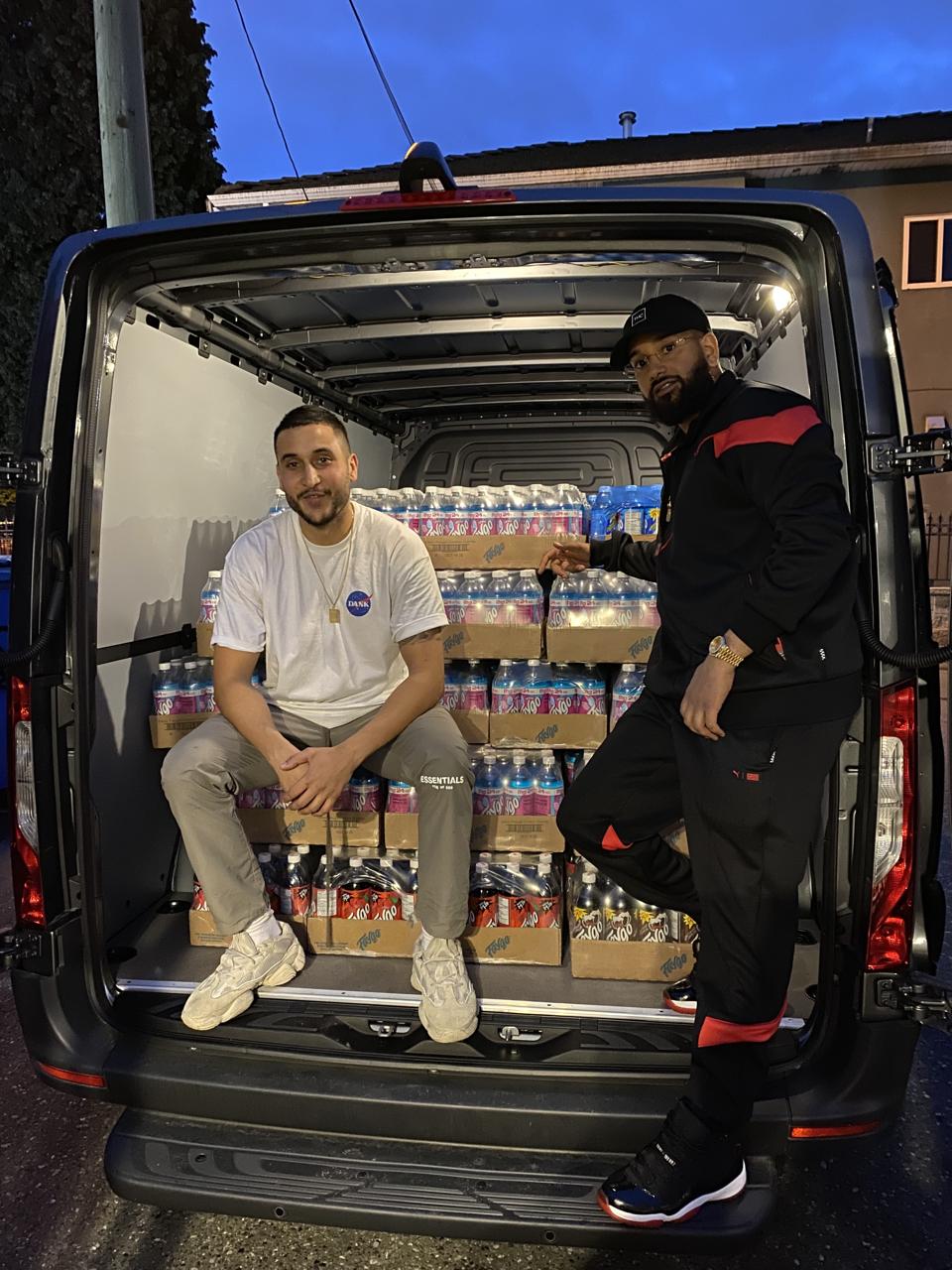 Shakur, left, and Sangara, right, in a van loaded with a fresh delivery for Dank Mart.