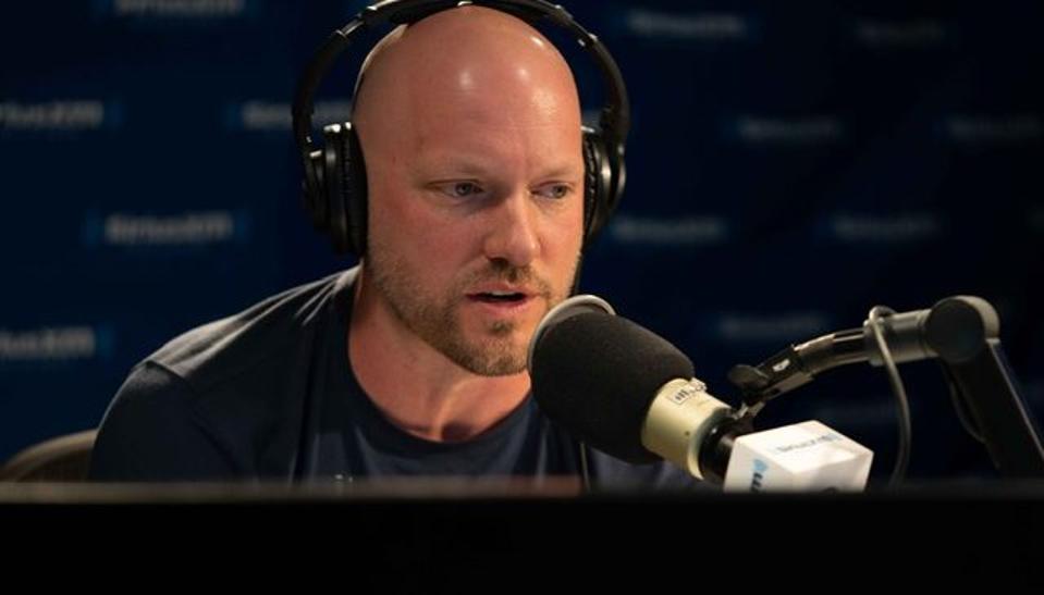 man who is podcasting