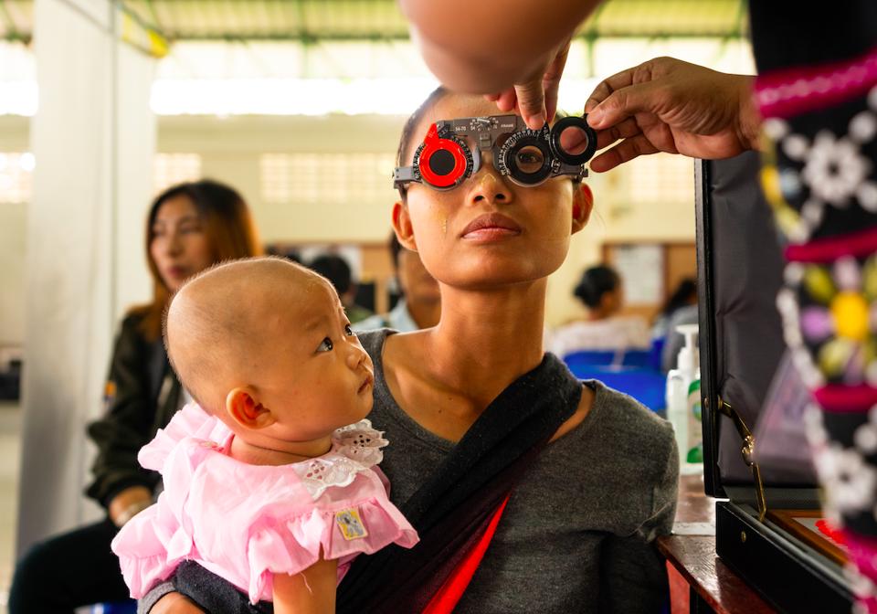 OneSight patient receiving an eye exam in Thailand.
