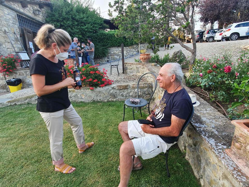 Monia Piccini Il Palagio di Panzano vineyard wears mask at Chianti Classico wine festival