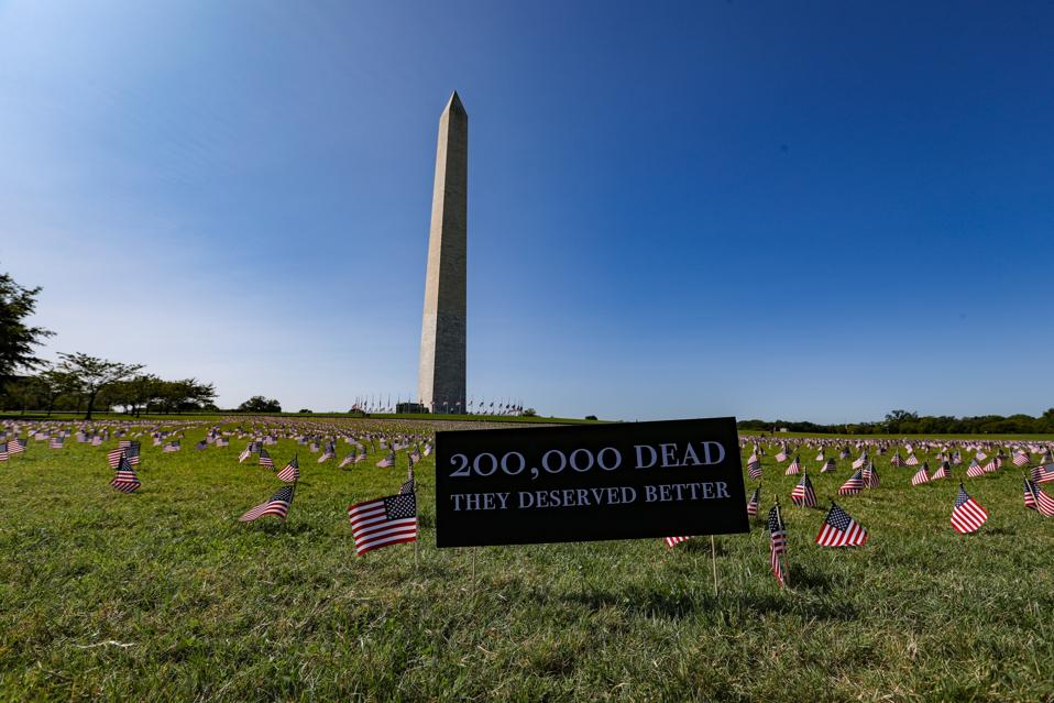 American flags placed on the National Mall for 200,000 American coronavirus victims