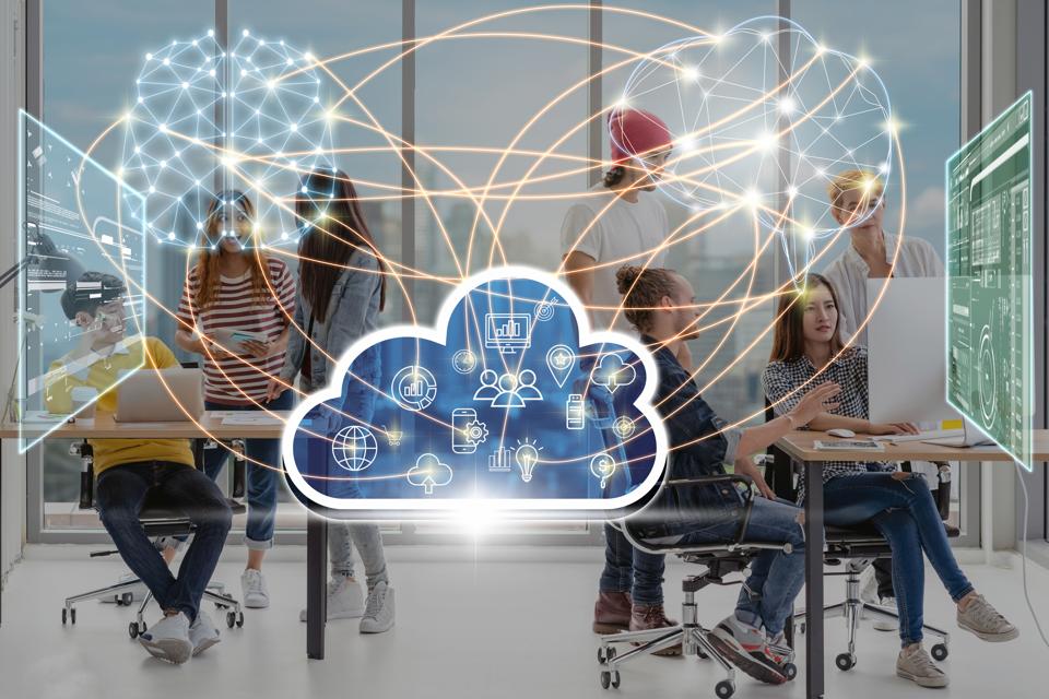 Group Of Asian and Multiethnic Business people brainstorming and working with brain and virtual screen connecting with cloud technology in the modern workplace, business group and technology concept