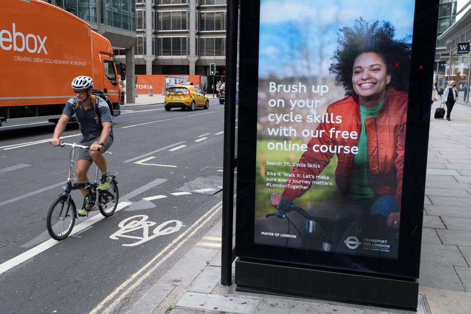 Cyclist And TFL Cycling Ad