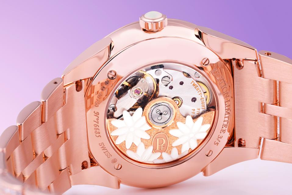 The rotor is nearly as decorated as the dial