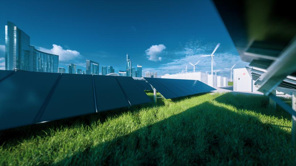 Modern black frameless solar panel farm, battery energy storage and wind turbines on fresh green grass under blue sky - concept of green sustainable energy system. 3d rendering.