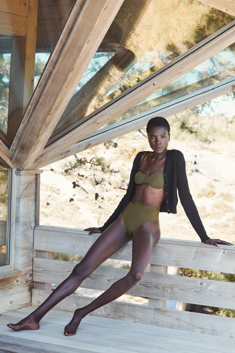 Model Adeng Nyaman posed in an olive-colored Cuup bikini.