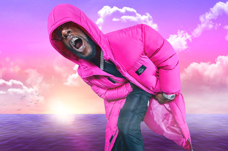 Burna Boy's pink puffer jacket for boohooMAN collection.