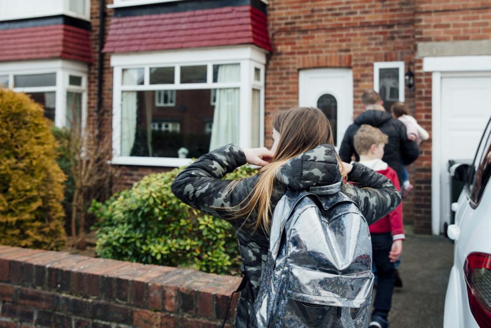 A family arriving home