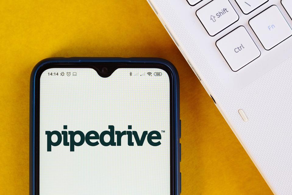 In this photo illustration the Pipedrive logo seen displayed...
