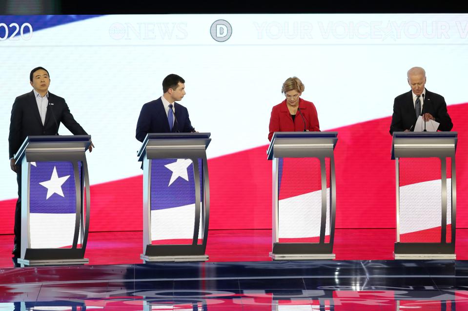 Democratic Presidential Candidates Debate In New Hampshire Ahead Of First Primary Contest