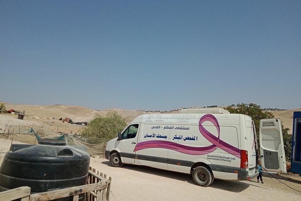 A van parked by a rural area