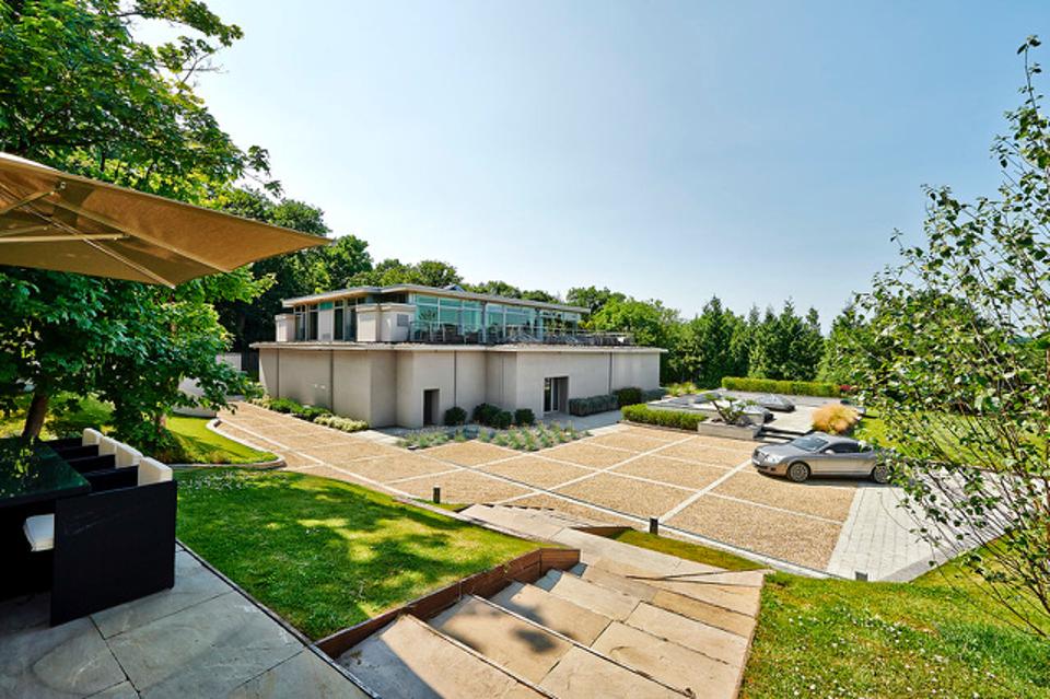The two-story bunker home, which is on the market for $12.9 million, has an indoor pool and cinema room