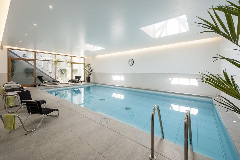 The pool is lit by skylights